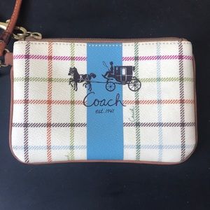 Cream pattern coach wristlet